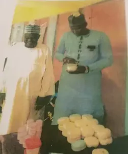 Honourable Dankajiba Mai Unguwa Checking pomade made by youths